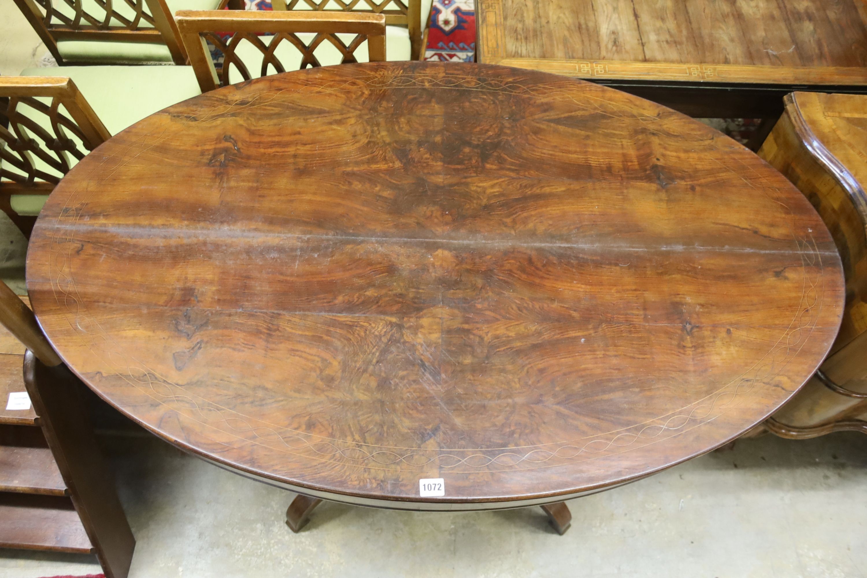 A 19th century French oval walnut centre table, width 130cm, depth 78cm, height 79cm